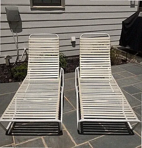 TWO VTG (1986) TROPITONE COMM. GRADE VINYL STRAPPED CHAISE LOUNGES, ORIG. OWNER
